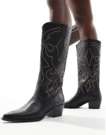 heeled western boot with stitching in black
