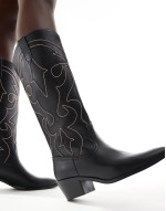 heeled western boot with stitching in black