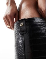 pointed knee high boots in black croc