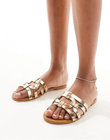 caged flat sandal in gold